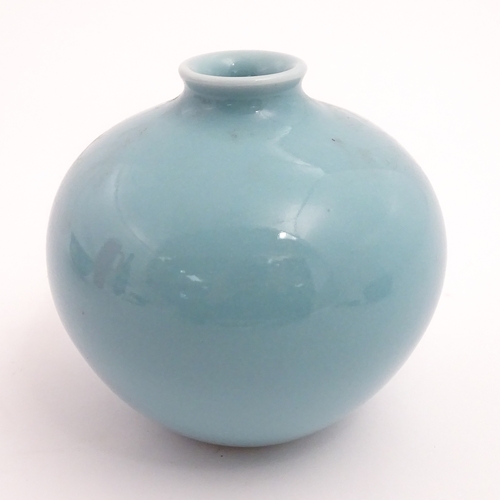 28 - A Chinese vase of squat form with turquoise ground. Character marks under. Approx. 4 3/4
