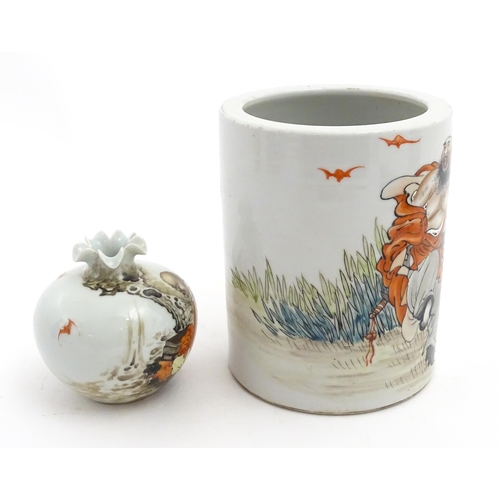 29 - A Chinese brush pot with figural and bat detail with Character script to reverse. Together with a sm... 