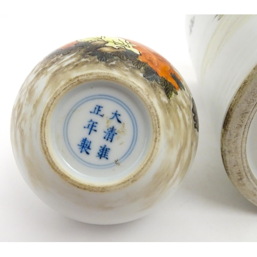 29 - A Chinese brush pot with figural and bat detail with Character script to reverse. Together with a sm... 