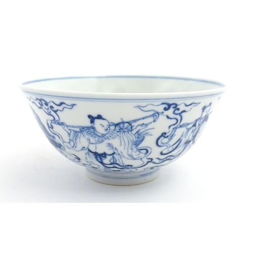 43 - A Chinese blue and white bowl decorated with the Eight Immortals. Character marks under. Approx. 3