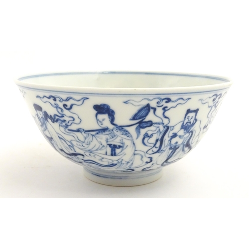 43 - A Chinese blue and white bowl decorated with the Eight Immortals. Character marks under. Approx. 3