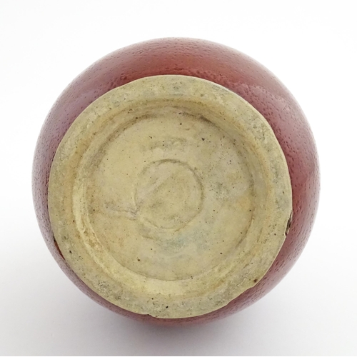 53 - A Chinese bottle vase with red sang de boeuf style glaze. Approx. 13 1/2