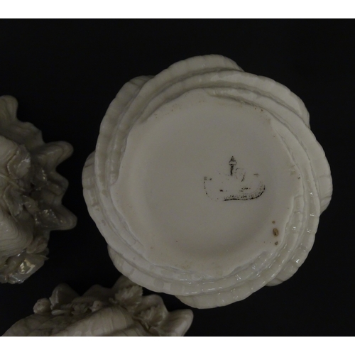 80 - Three small Belleek Neptune vases / jardinieres with applied flower and foliage decoration. Each bea... 