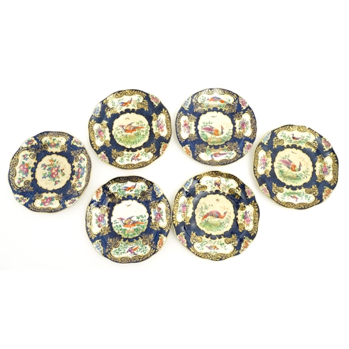 206A - A quantity of Booths dessert service wares in the Scale Blue pattern, decorated with flowers and exo... 