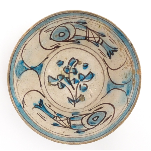 210 - A Continental bowl with decorated with fish and flowers. Approx. 3 1/2