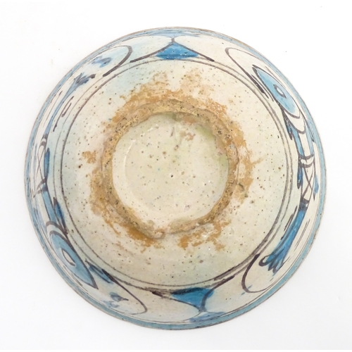 210 - A Continental bowl with decorated with fish and flowers. Approx. 3 1/2