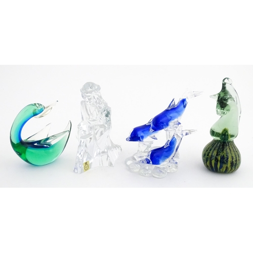 322 - Four assorted glass paperweights / models  to include a Mdina glass seahorse paperweight, unsigned, ... 