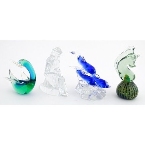 322 - Four assorted glass paperweights / models  to include a Mdina glass seahorse paperweight, unsigned, ... 