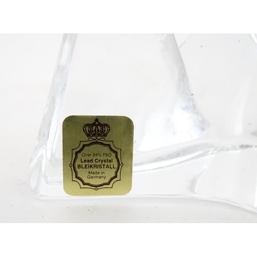 322 - Four assorted glass paperweights / models  to include a Mdina glass seahorse paperweight, unsigned, ... 