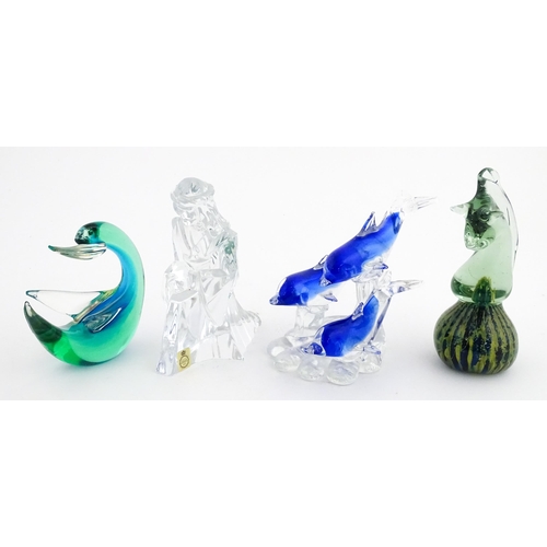 322 - Four assorted glass paperweights / models  to include a Mdina glass seahorse paperweight, unsigned, ... 