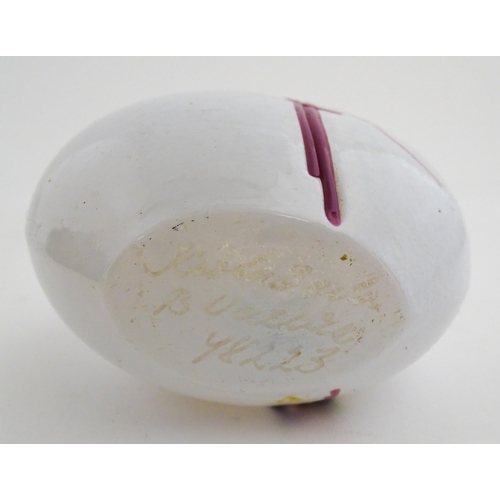 332 - A Kosta Boda glass rainbow vase designed by Bertil Vallien, signed and numbered under.  Together wit... 