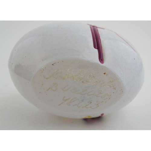 332 - A Kosta Boda glass rainbow vase designed by Bertil Vallien, signed and numbered under.  Together wit... 