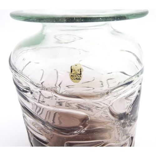 335 - A Mdina glass vase with trail detail. Approx. 8 1/2