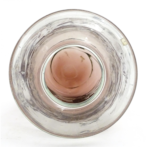 335 - A Mdina glass vase with trail detail. Approx. 8 1/2