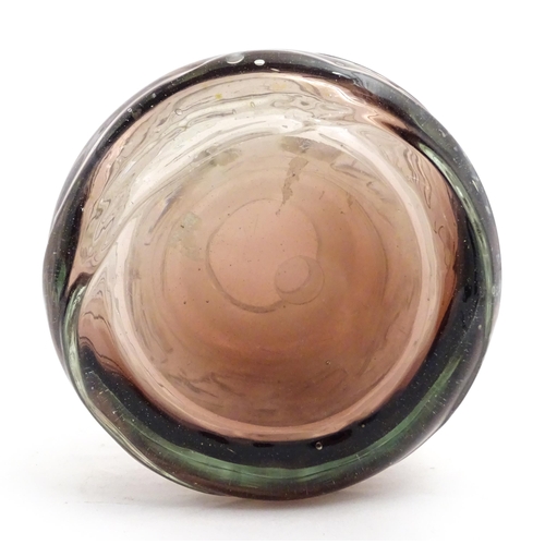 335 - A Mdina glass vase with trail detail. Approx. 8 1/2