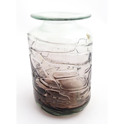 335 - A Mdina glass vase with trail detail. Approx. 8 1/2