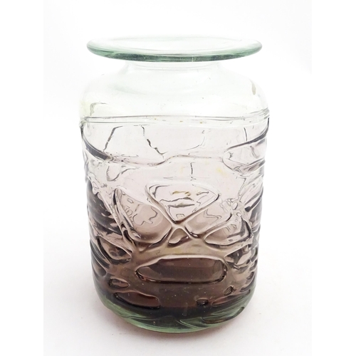 335 - A Mdina glass vase with trail detail. Approx. 8 1/2