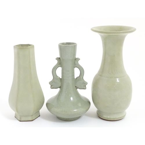 30 - Three Chinese celadon vases to include a one with a flared rim, one with twin handles of stylised fi... 