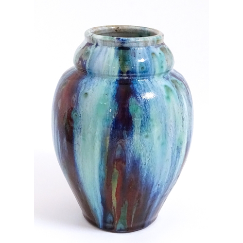 8 - A Chinese high fired vase of tapering form. Approx. 8 3/4