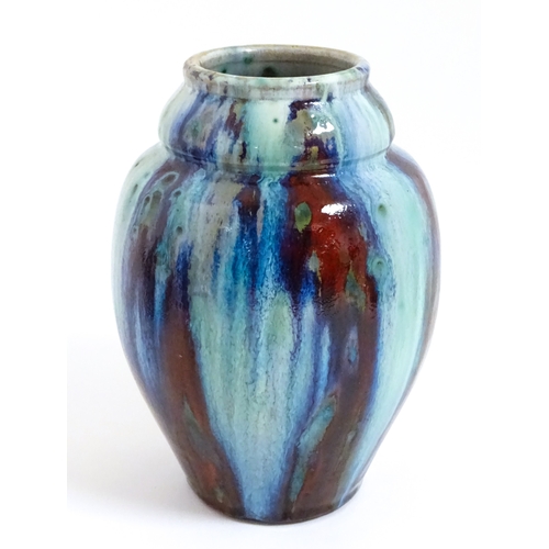 8 - A Chinese high fired vase of tapering form. Approx. 8 3/4