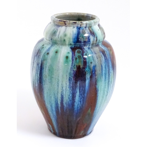 8 - A Chinese high fired vase of tapering form. Approx. 8 3/4