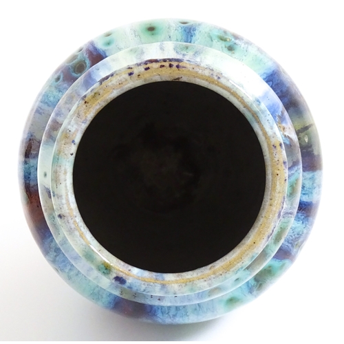 8 - A Chinese high fired vase of tapering form. Approx. 8 3/4