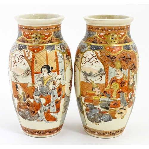 59 - A pair of Japanese Satsuma vases decorated with an Imperial figure and attendants, and a female figu... 