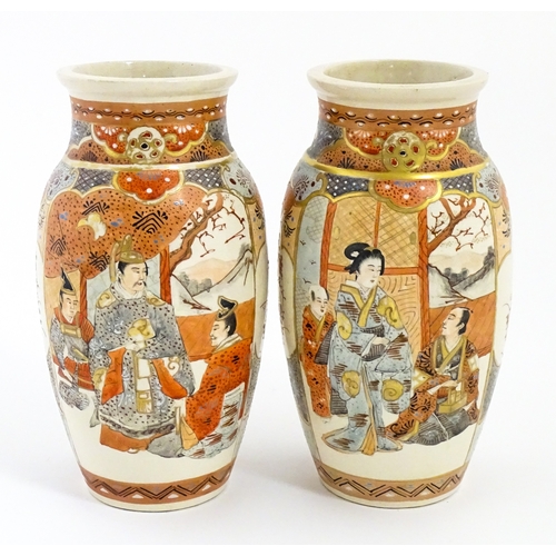 59 - A pair of Japanese Satsuma vases decorated with an Imperial figure and attendants, and a female figu... 