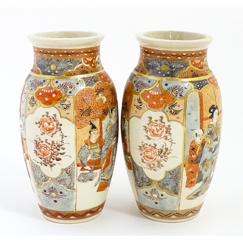59 - A pair of Japanese Satsuma vases decorated with an Imperial figure and attendants, and a female figu... 
