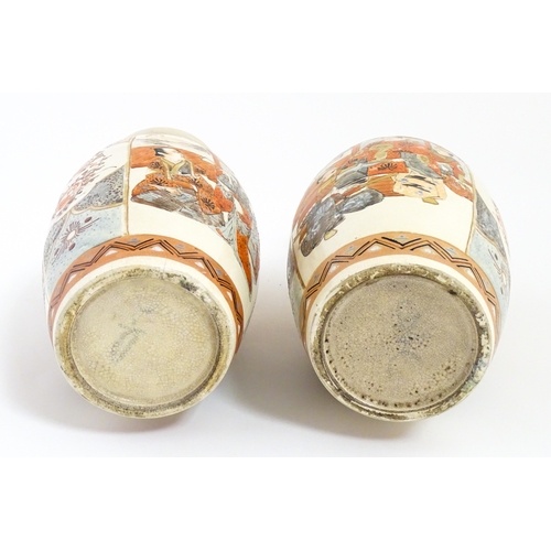 59 - A pair of Japanese Satsuma vases decorated with an Imperial figure and attendants, and a female figu... 