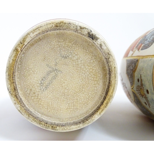 59 - A pair of Japanese Satsuma vases decorated with an Imperial figure and attendants, and a female figu... 