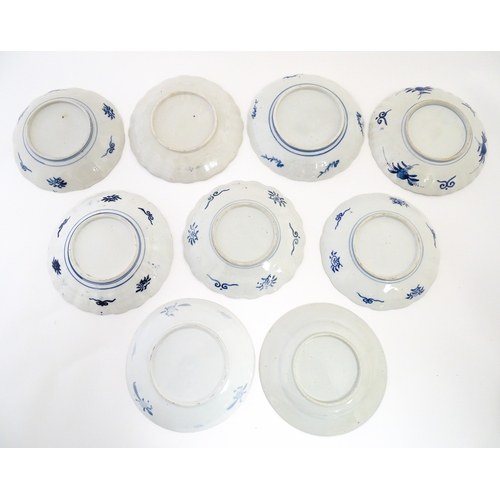 64 - Nine assorted Japanese plates / dishes decorated in the Imari palette with flowers, foliage, etc. La... 