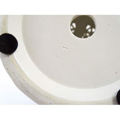 66 - A Chinese vase with reticulated decoration and banded leaf motifs. Approx. 14 3/4