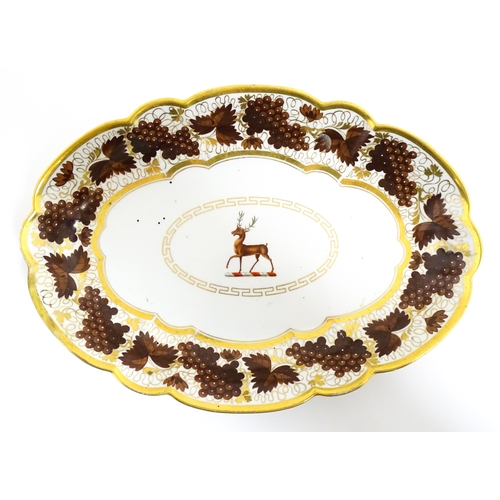 74 - A Barr Flight & Barr dish of oval form with lobed edges decorated with stag armorial to centre, bord... 