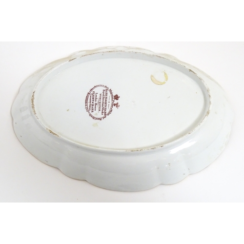 74 - A Barr Flight & Barr dish of oval form with lobed edges decorated with stag armorial to centre, bord... 