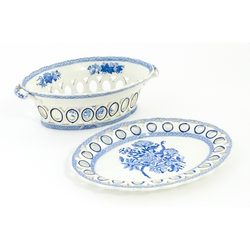 75 - A blue and white chestnut basket and stand with pierced decoration and floral detail. Possibly Spode... 