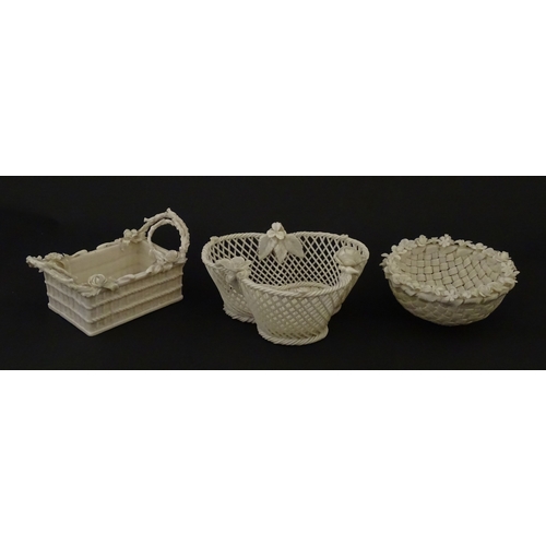 79 - Three Belleek baskets to include a three strand example of shamrock form, a round basket with applie... 