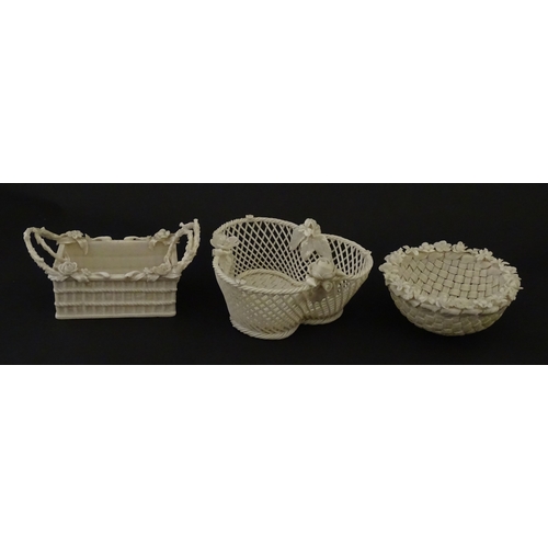 79 - Three Belleek baskets to include a three strand example of shamrock form, a round basket with applie... 