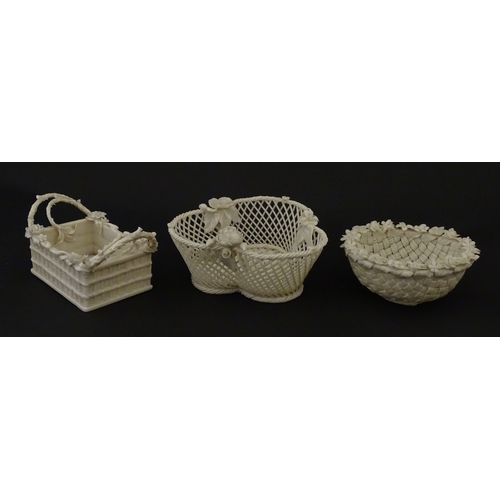 79 - Three Belleek baskets to include a three strand example of shamrock form, a round basket with applie... 