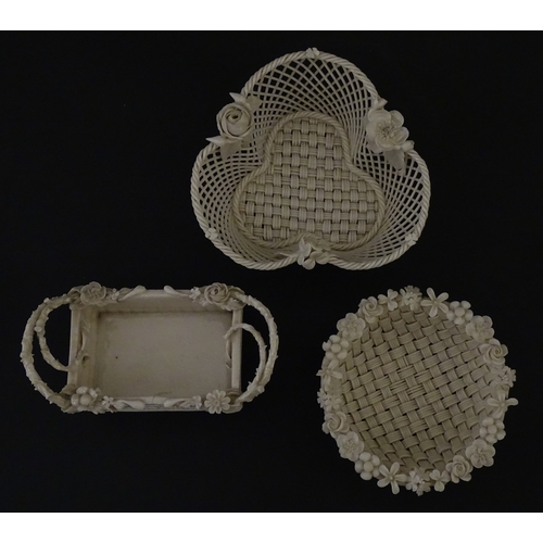 79 - Three Belleek baskets to include a three strand example of shamrock form, a round basket with applie... 