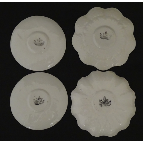 82 - Two Belleek Lily pattern cups and saucers with green highlights. Together with a Belleek 5 O'Clock p... 