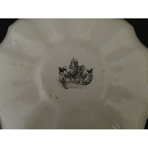 82 - Two Belleek Lily pattern cups and saucers with green highlights. Together with a Belleek 5 O'Clock p... 