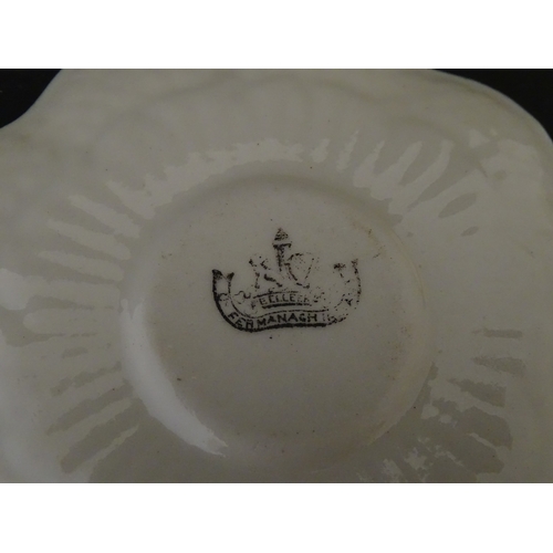 82 - Two Belleek Lily pattern cups and saucers with green highlights. Together with a Belleek 5 O'Clock p... 