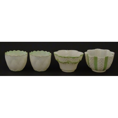 82 - Two Belleek Lily pattern cups and saucers with green highlights. Together with a Belleek 5 O'Clock p... 