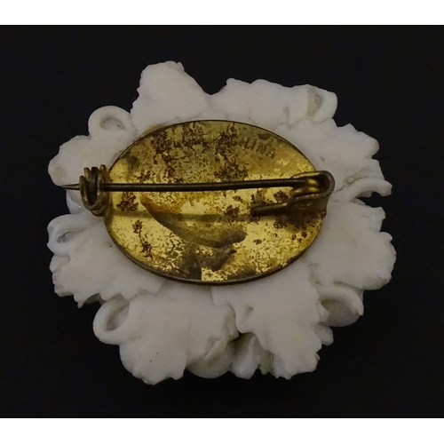 83 - Six assorted Belleek items comprising a cream jug in the Ampanida pattern, a small vase with bow det... 