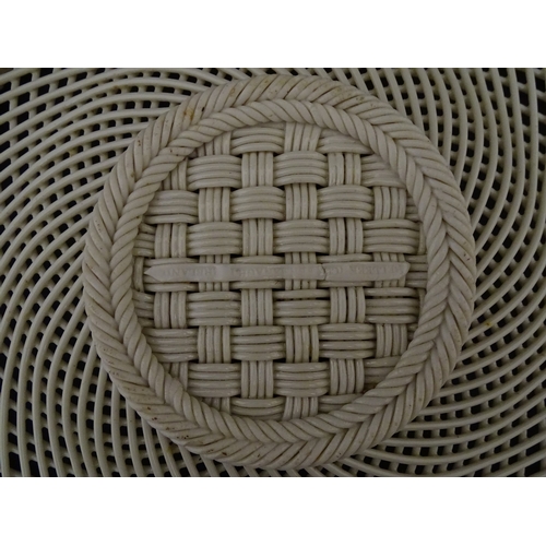 84 - Two Belleek four strand basket weave cake plates. Impressed marks under. Largest approx. 11 1/2