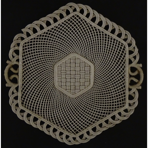 84 - Two Belleek four strand basket weave cake plates. Impressed marks under. Largest approx. 11 1/2