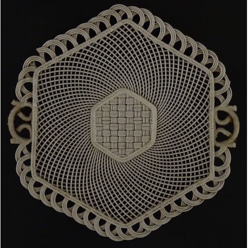 84 - Two Belleek four strand basket weave cake plates. Impressed marks under. Largest approx. 11 1/2