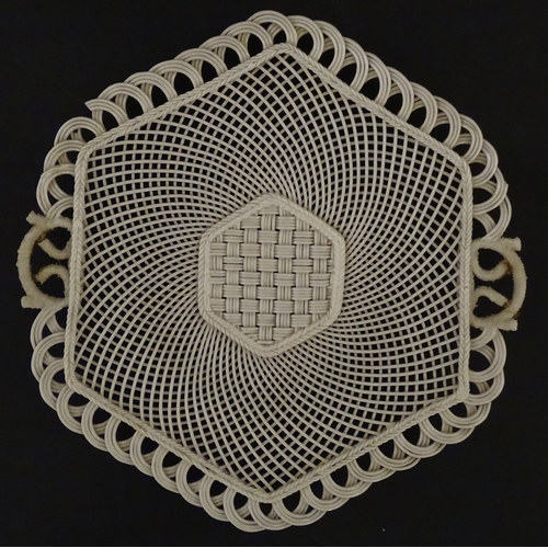 84 - Two Belleek four strand basket weave cake plates. Impressed marks under. Largest approx. 11 1/2