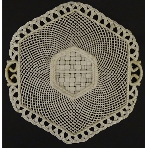 84 - Two Belleek four strand basket weave cake plates. Impressed marks under. Largest approx. 11 1/2